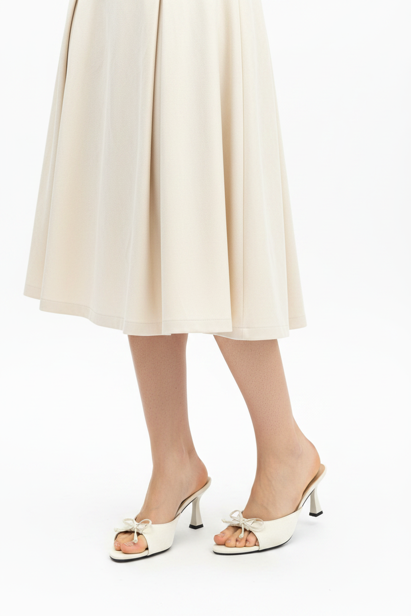 KRISS Ivory Bow Heel Close-up Editorial