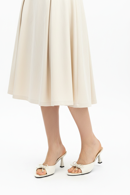 KRISS Ivory Bow Heel Close-up Editorial